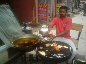 jalebiMaking hot piping sweet Jalebis at Samrat sweet shop, Jaipur