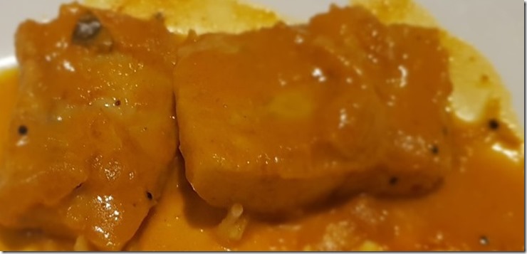 fish curry with mango close up